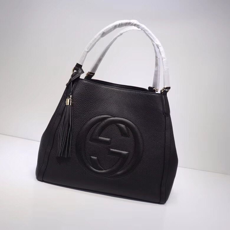 G*u*i top handle bags